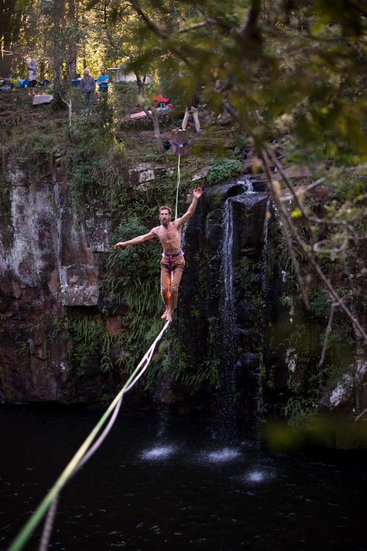 Man slacklining over a gorge